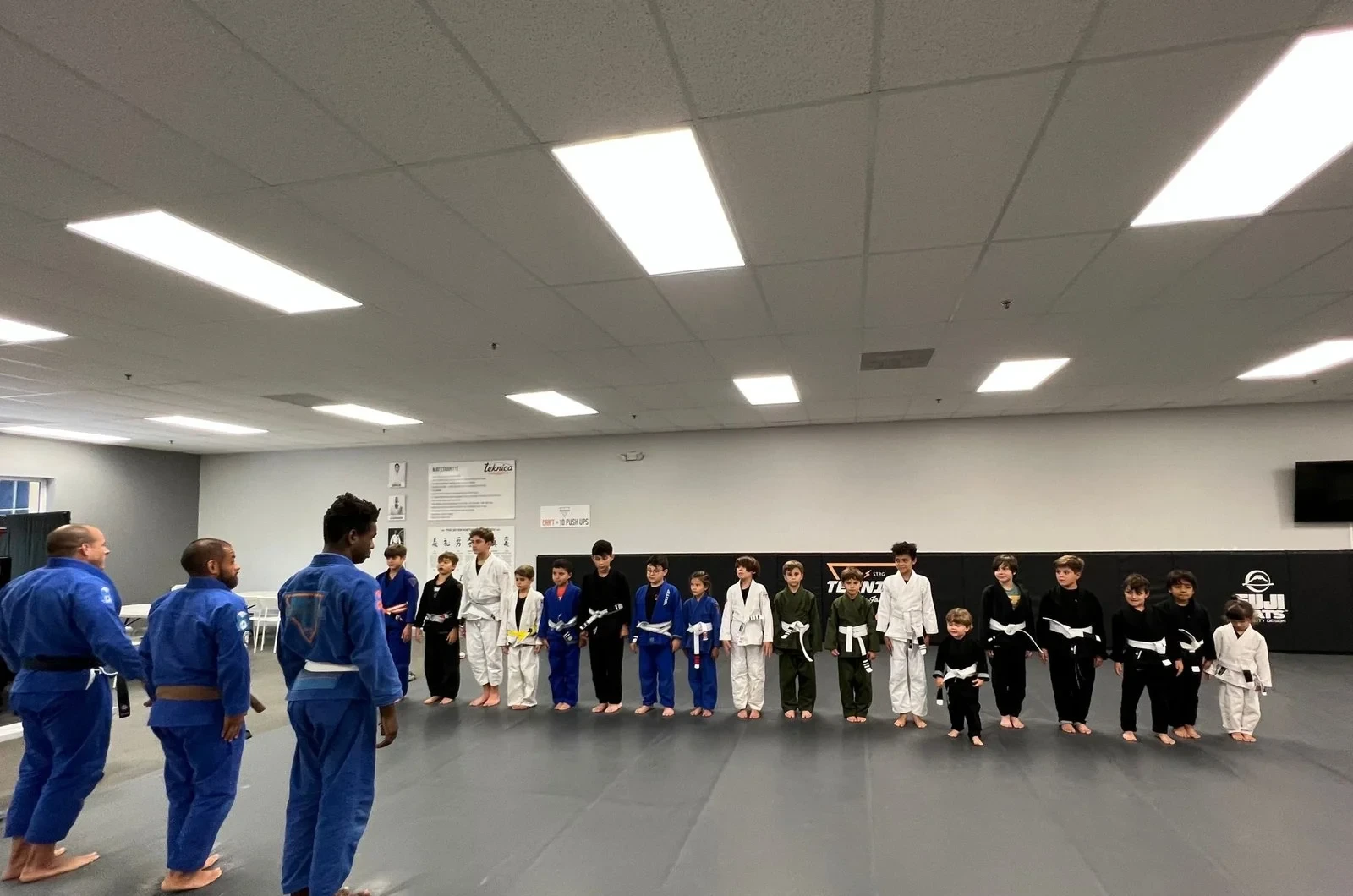Kids learning sportsmanship through martial arts